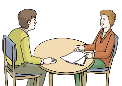 Zwei Personen am Tisch reden